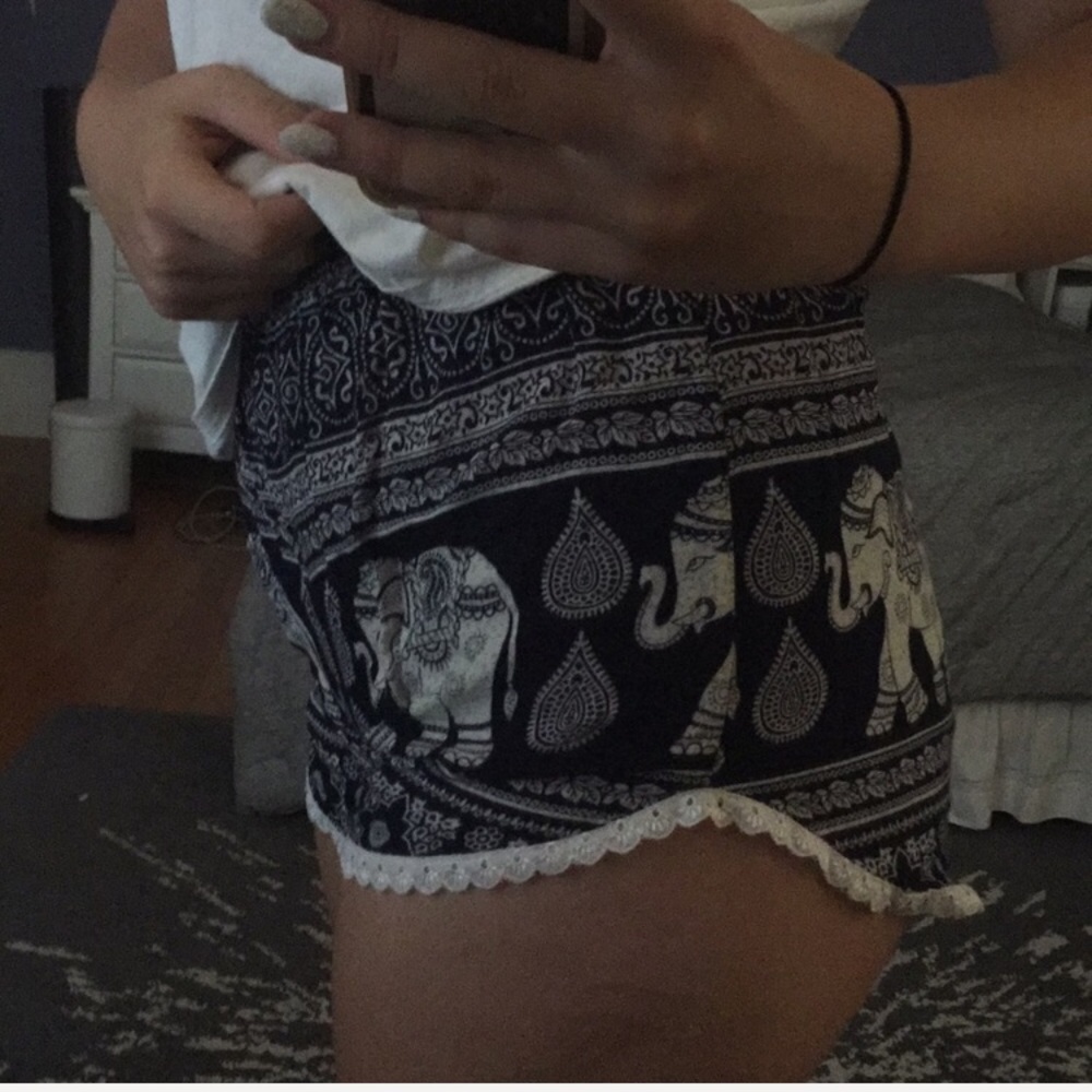Blue shorts with white pattern